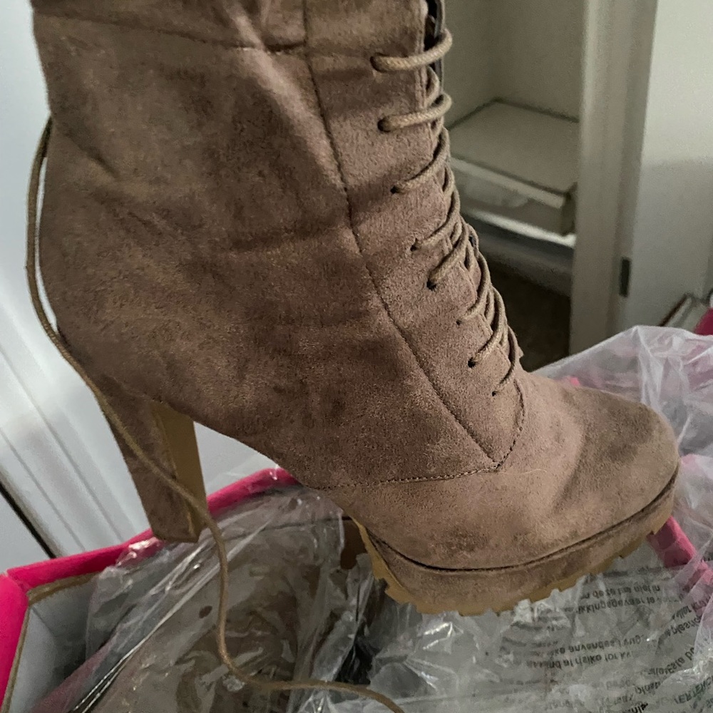 Thigh high brown suede lace up high heel boots